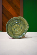 Hand-thrown spiral spoon rest in Canopy, olive and blue-green