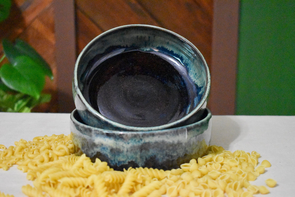 Pair of hand-thrown tall-walled plates (blates) in Mossy Hollow, deep indigo shifting to soft sage along the upper walls