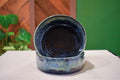Pair of hand-thrown tall-walled plates (blates) in Mossy Hollow, deep indigo shifting to soft sage along the upper walls