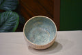 Hand-thrown bowl in Shallows, speckled oatmeal cream outside and pale blue-green pooling inside