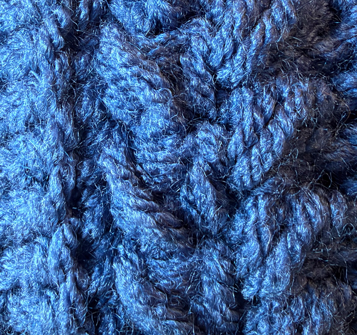 Close-up of crochet stitches in Country Blue, a medium blue